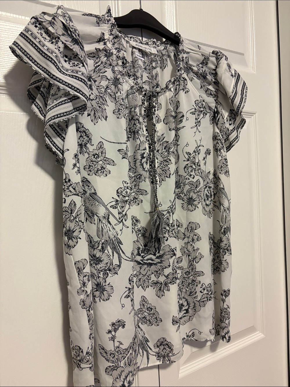 Rose & Olive Black and Off White Floral Tie-Neck Flutter Sleeve Blouse